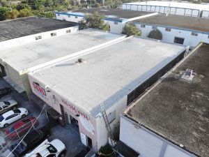 Flat roof installed on a company building in a commercial area of Florida