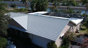 a tile roof installed on a waterfront home